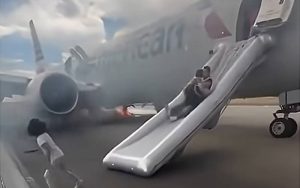 Brake fire forces emergency evacuation of American airlines flight in Denver